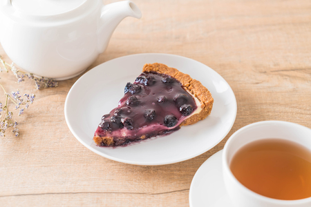 blueberry pie with english teaの写真素材