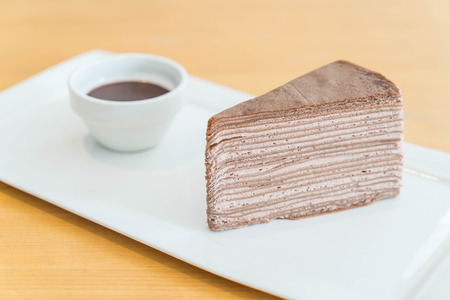 chocolate crape cake with chocolate sauceの写真素材