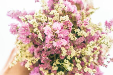 flowers bouquet decoration on dinning tableの写真素材