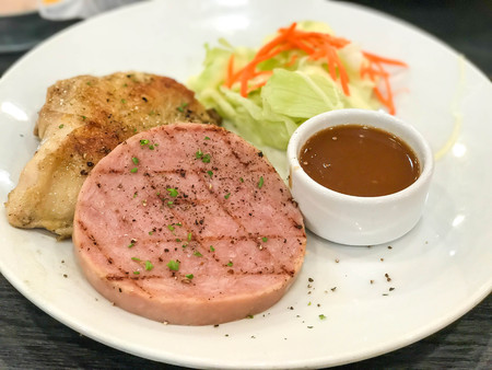 ham and chicken steak with sauceの写真素材