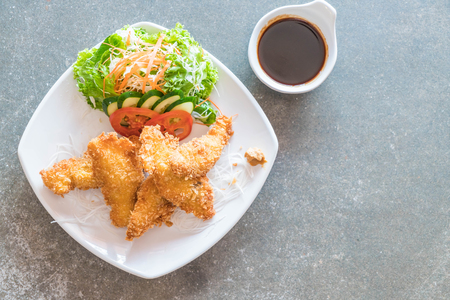 fried fish with tonkatsu sauce - japanese food styleの写真素材