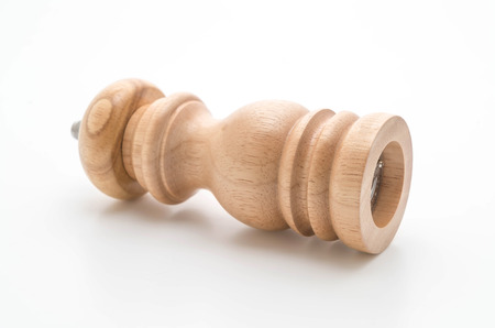 pepper mill isolated on whiteの写真素材