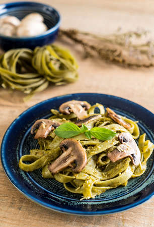 spinach fettuccine with mushroom - Italian food styleの写真素材