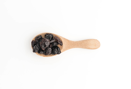 black raisins on white backgroundの写真素材