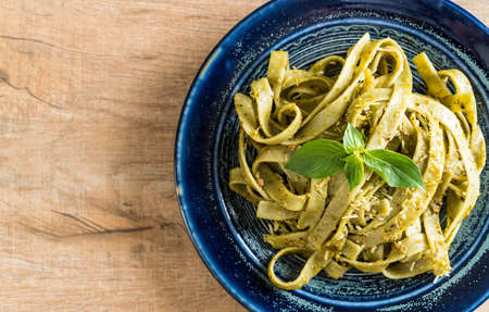 spinach fettuccine on plate - Italian food styleの写真素材