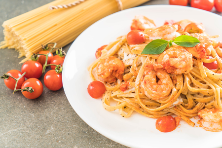 delicious spaghetti with shrimps, tomatoes, basil and cheese - italian food styleの写真素材