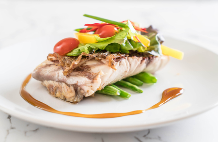 snapper fish steak with vagetableの写真素材