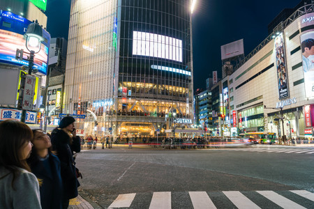 Tokyo, Japan, Nov 17, 2016: Shibuya Crossing Of City street with crowd people on zebra crosswalk in Shibuya town. Shibuya is a special ward located in Tokyo for shopping at night.のeditorial素材