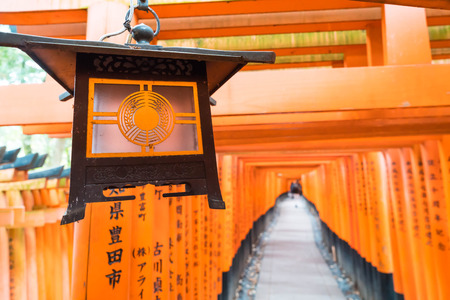 the red torii gates walkway at fushimi inari taisha shrine in Kyoto, Japanのeditorial素材