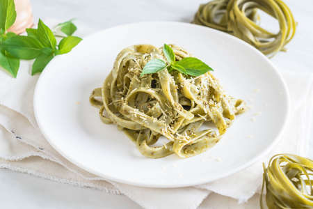 spinach fettuccine on plate - Italian food styleの写真素材