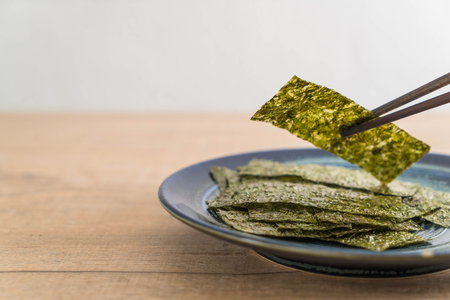 dried seaweed on plate - healthy foodの写真素材