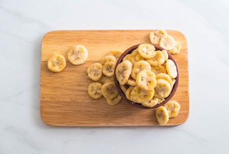 banana crispy chips in bowlの写真素材