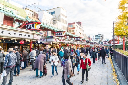 Toyko, Japan - 28 NOV 2016: Tourists walk on Nakamise Dori in Sensoji shrine. Sensoji temple at Japan.のeditorial素材