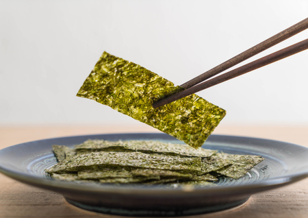 dried seaweed on plate - healthy foodの写真素材
