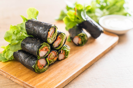 seaweed salad roll with crab stick - healthy food styleの写真素材