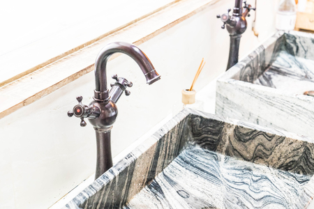 Beautiful vintage faucets in bathroomの写真素材