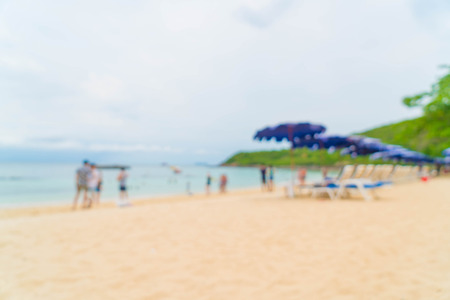 abstract blur beautiful luxury umbrella and chair on sea and beach for backgroundの写真素材