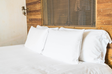 white pillow on bed interior decoration in bedroomの写真素材