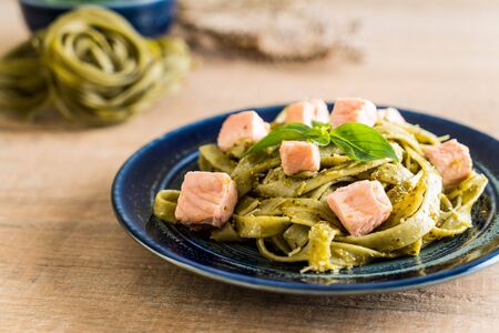 spinach fettuccine with salmon - Italian food styleの写真素材