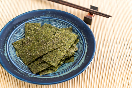 dried seaweed on plate - healthy foodの写真素材