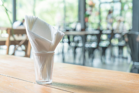 tissue in glass on tableの写真素材