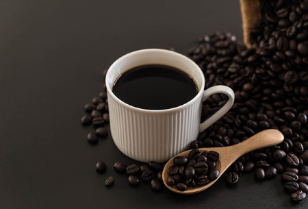 Coffee cup with coffee beansの写真素材