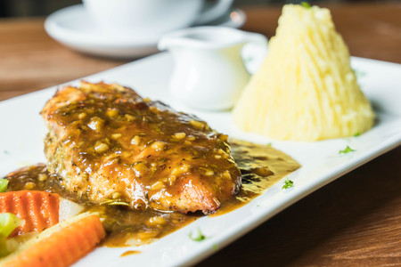 chicken steak with mashed potato and vagetableの写真素材