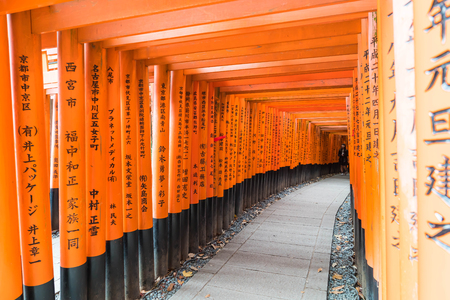the red torii gates walkway at fushimi inari taisha shrine in Kyoto, Japanのeditorial素材