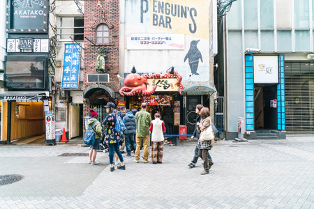 OSAKA, JAPAN - NOV 19 2016: Group of the people walking to shopping at the Osaka night market at Osaka city, Japanのeditorial素材