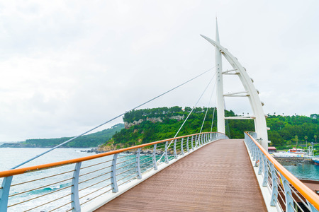 Saeyeongyo bridge between Seaseom and Seogwipo port in Jeju island, South Korea.の写真素材