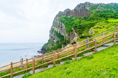 View of SeongSan Ilchulbong (Volcanic Cone) in Jeju Island, South Korea.の写真素材