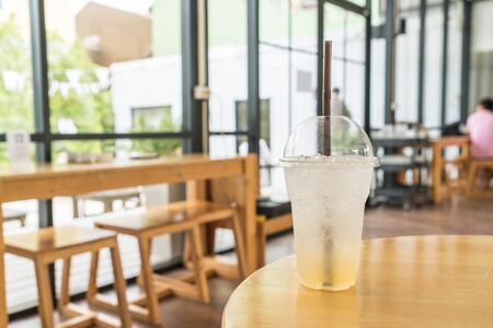 iced honey lemon soda in cafeの写真素材