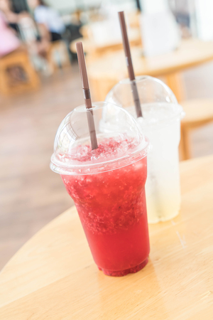 iced raspberry soda in cafeの写真素材