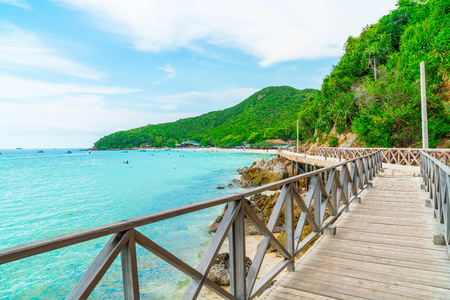 Wooden Bridge with beautiful tropical beach at Koh Larn in Pattaya, Thailand.の写真素材