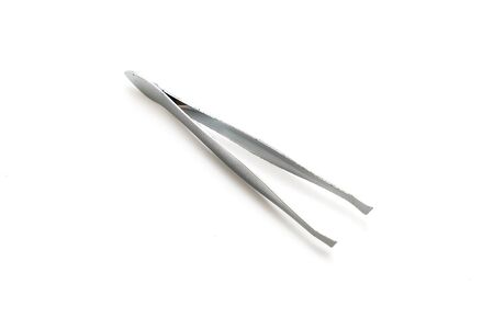 tweezers isolated on white backgroundの写真素材