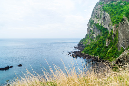 View of SeongSan Ilchulbong (Volcanic Cone) in Jeju Island, South Korea.の写真素材