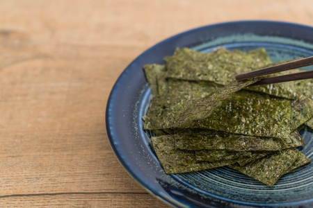 dried seaweed on plate - healthy foodの写真素材