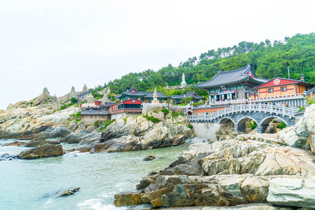 Beautiful Architecture at Haedong Yonggungsa Temple sits upon a cliff in Busan, South Korea.のeditorial素材