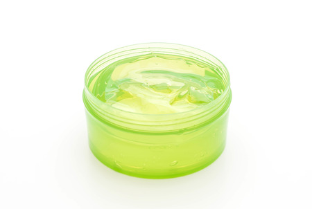 aloevera gel in jar isolated on white backgroundの写真素材
