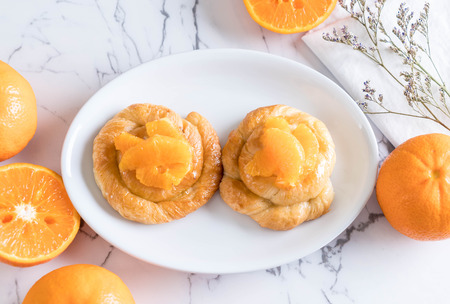 orange tart on white plate