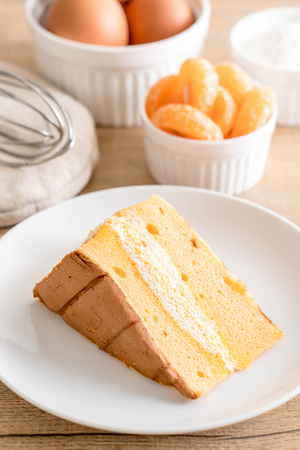 orange chiffon cake on tableの写真素材