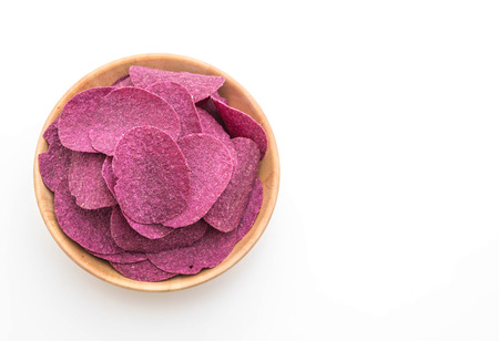 sweet potato chips isolated on white backgroundの写真素材