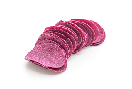 sweet potato chips isolated on white backgroundの写真素材