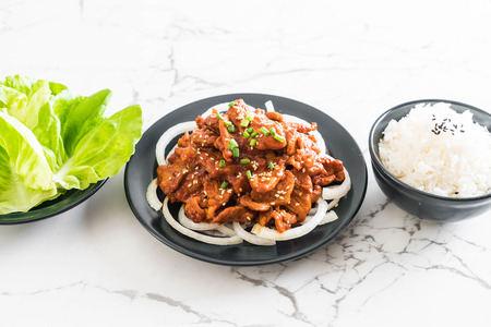 fried pork with spicy korean sauce (bulgogi) - korean food styleの写真素材