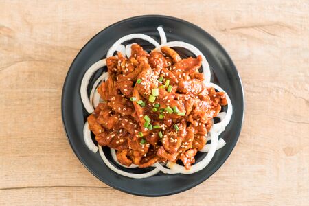 fried pork with spicy korean sauce (bulgogi) - korean food styleの写真素材