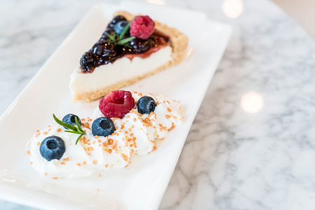blueberry cheese cake on plateの写真素材