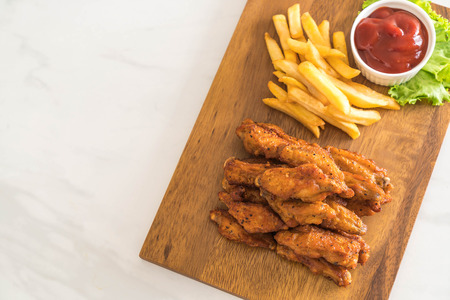 fried chicken wings with sauceの写真素材