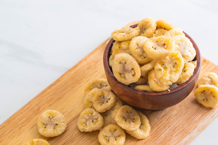 banana crispy chips in bowlの写真素材