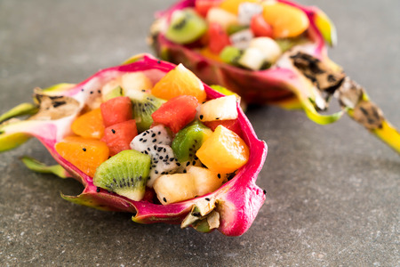 mix sliced fruits (orange, dragon fruit, watermelon, pineapple, kiwi)の写真素材