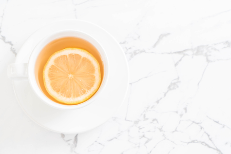 a cup of hot lemon teaの写真素材